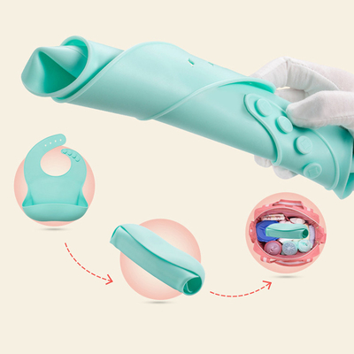 Les bavoirs 2022 imperméables chauds de bébé de silicone de catégorie comestible de vente d'Amazone vendent en gros avec la poche de receveur